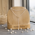 Double Layered Pearl Necklace with Bow Detail