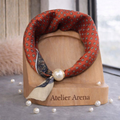Orange-Red Scarf with Geometric Pattern