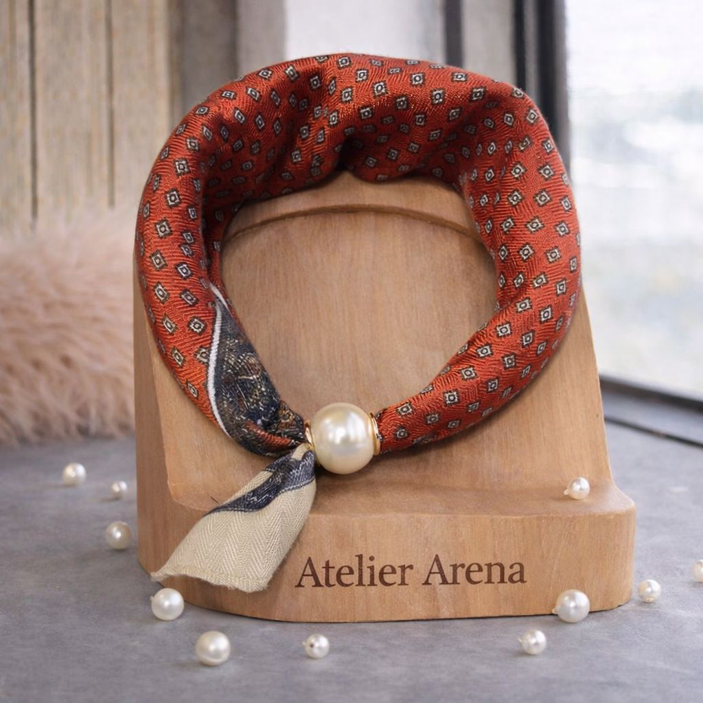 Orange-Red Scarf with Geometric Pattern